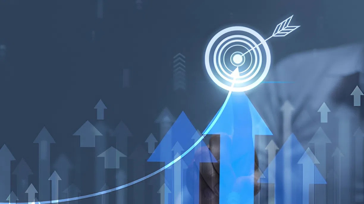 Target hitting a bullseye with upward arrows and a growth chart representing scaling